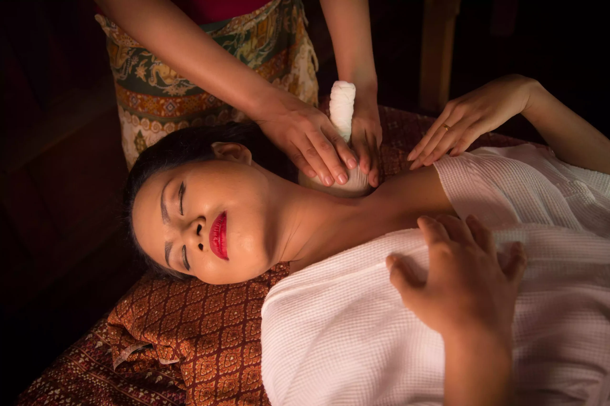 woman-receiving-massage-clavicle